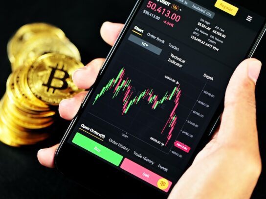 An investor looking at the Bitcoin price in an exchange mobile application